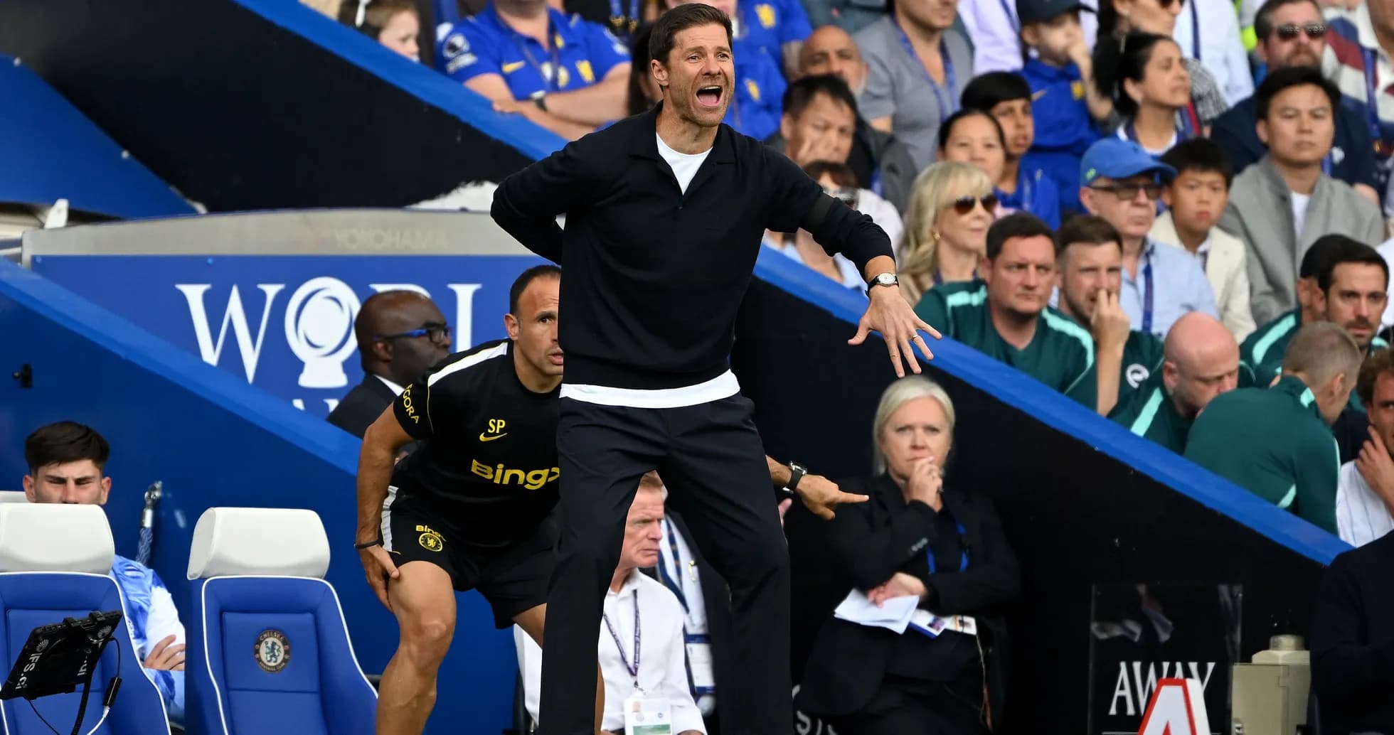 Coach gesturing from the sidelines during match Coach gesturing from the sidelines during match