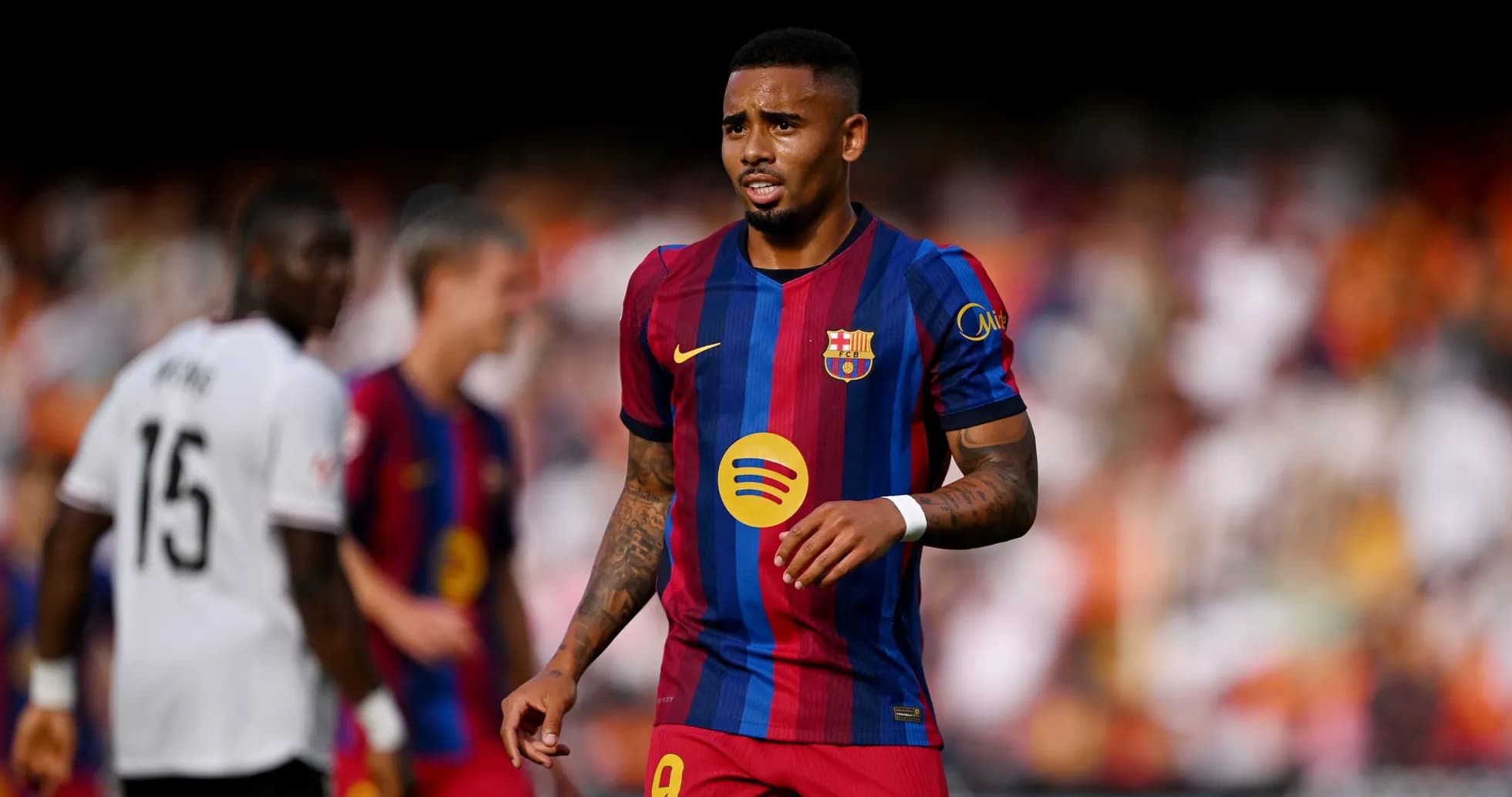 Barcelona player walking on field during match Barcelona player walking on field during match