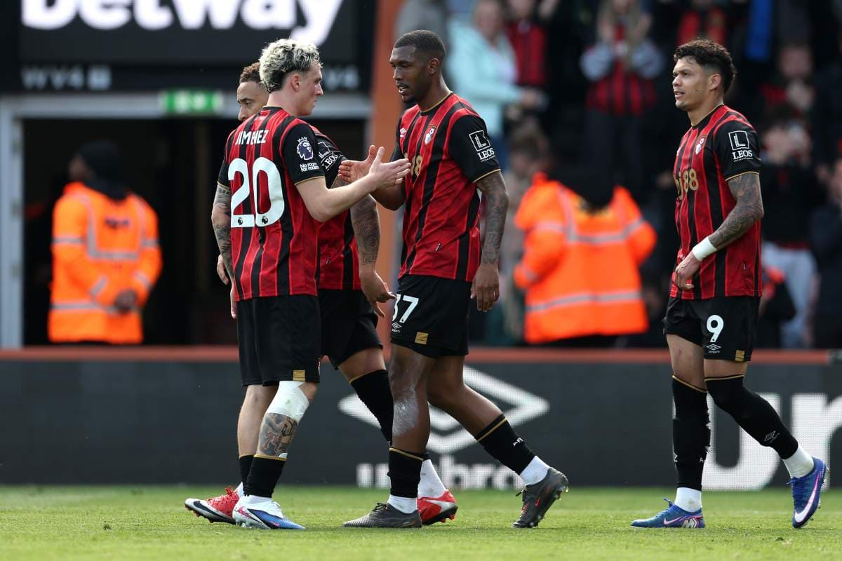 Bournemouth players celebrating a goal on the pitch Bournemouth players celebrating a goal on the pitch