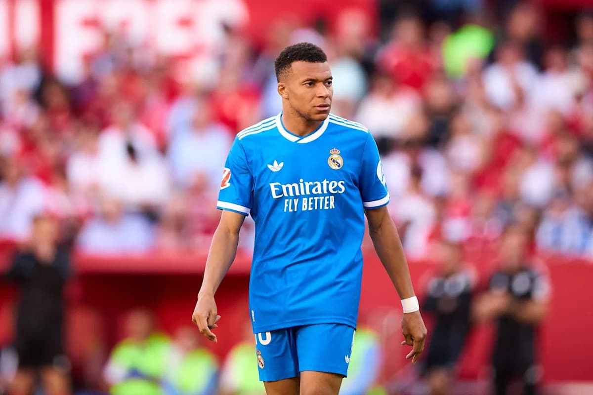 Player walking on the pitch in blue jersey Player walking on the pitch in blue jersey