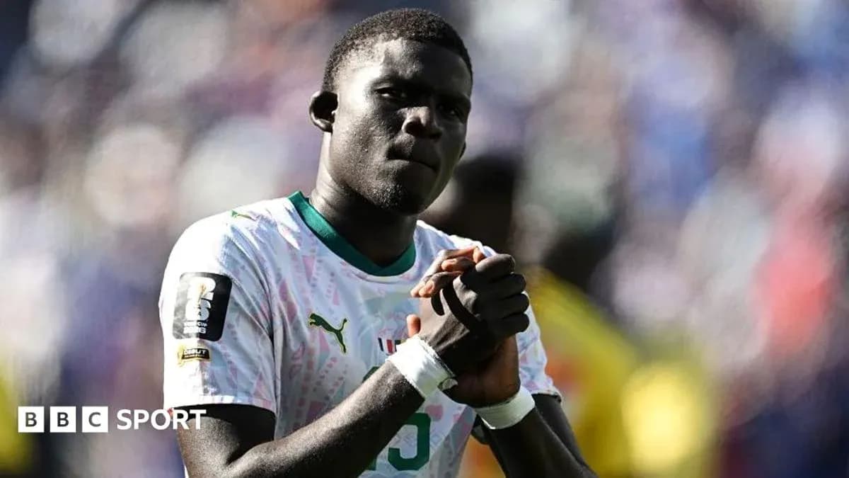 Player in national team jersey during match celebration Player in national team jersey during match celebration