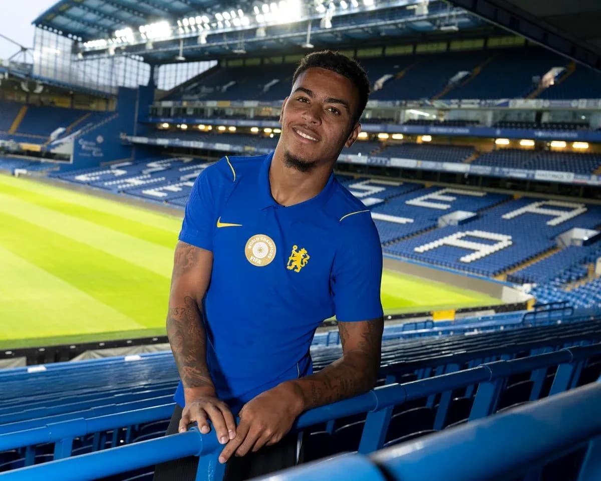 Player posing in stadium with Chelsea colors Player posing in stadium with Chelsea colors