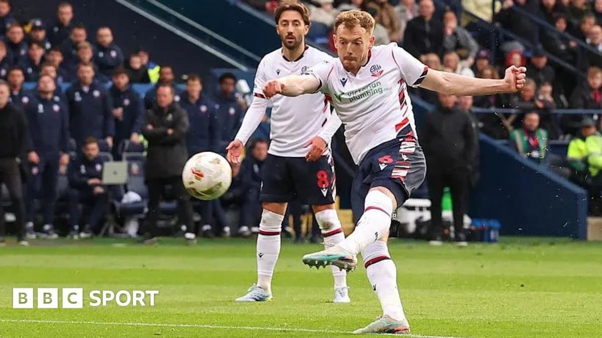 Player taking a penalty kick during match Player taking a penalty kick during match