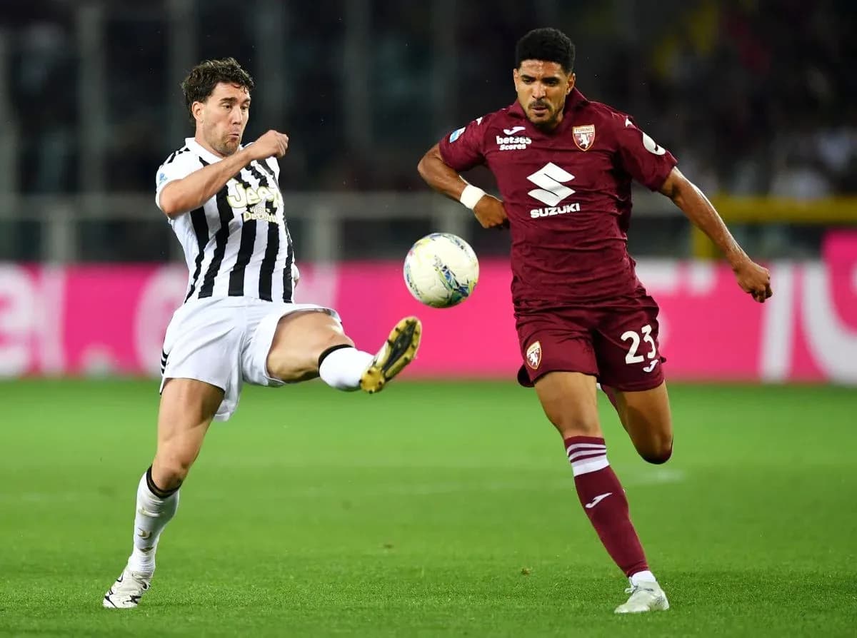 Players competing for the ball during Torino vs Juventus Players competing for the ball during Torino vs Juventus