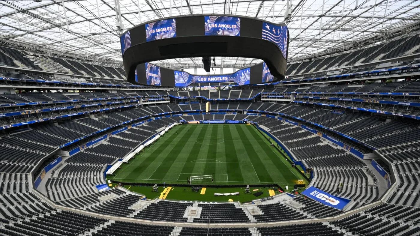 Interior view of stadium with empty seats and field Interior view of stadium with empty seats and field