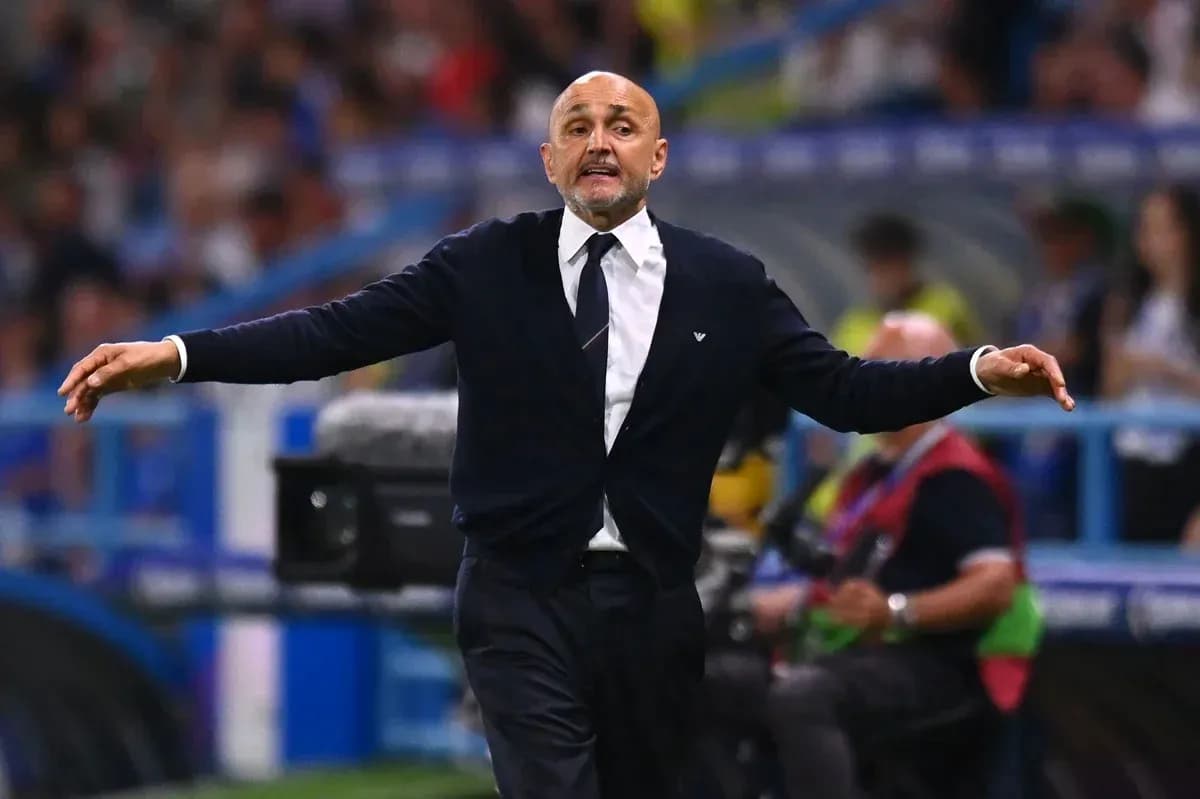 Coach gesturing during a football match on the sidelines Coach gesturing during a football match on the sidelines