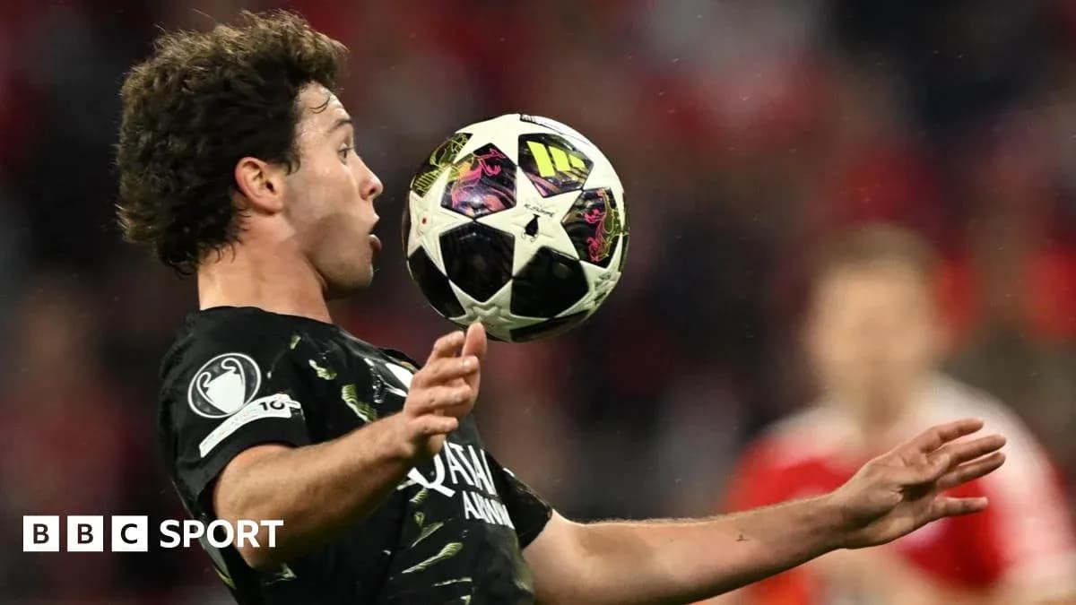 Player controlling the ball during a football match Player controlling the ball during a football match