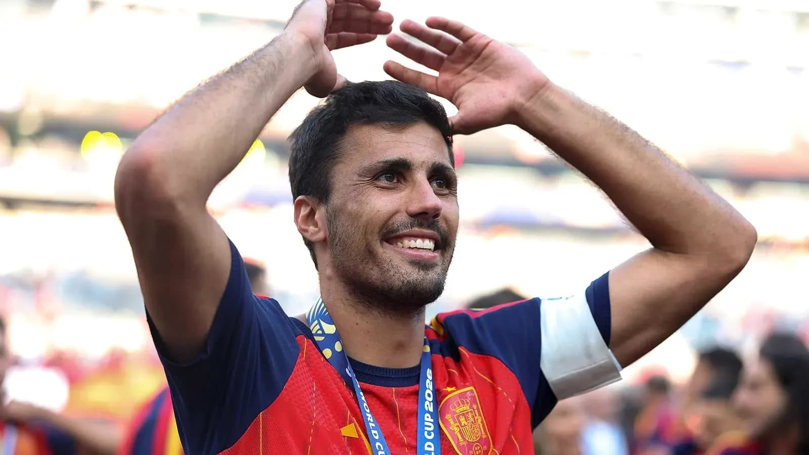 Player celebrating with arms raised after victory Player celebrating with arms raised after victory