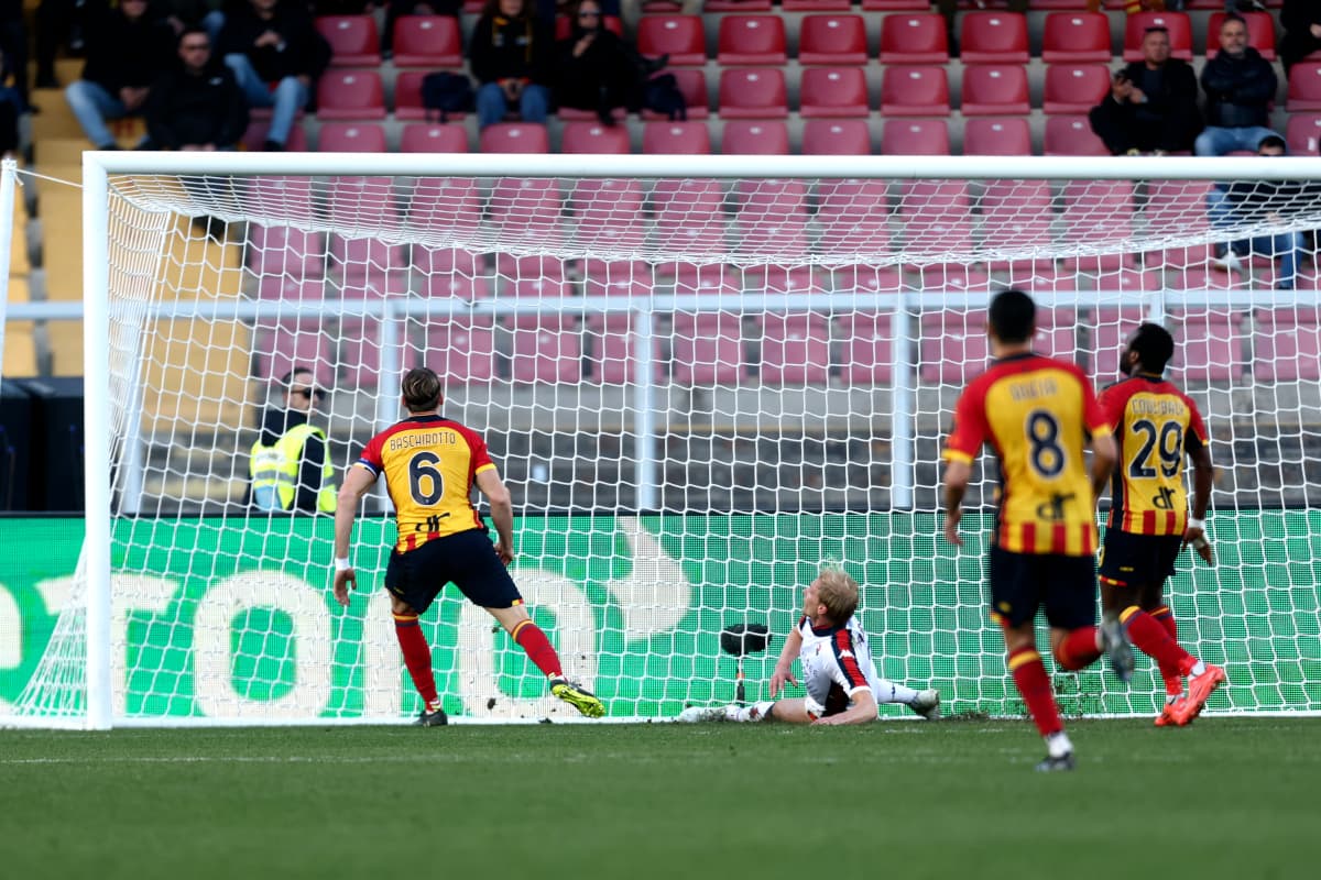 Lecce player scoring against Genoa in Serie A Lecce player scoring against Genoa in Serie A